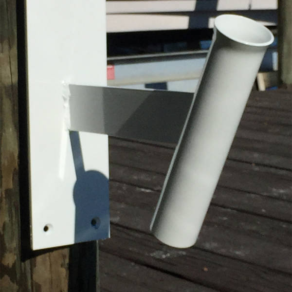 Image of white Dock/Wall Mounts for Manta Racks on a dock.